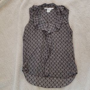 Long sleeveless blouse